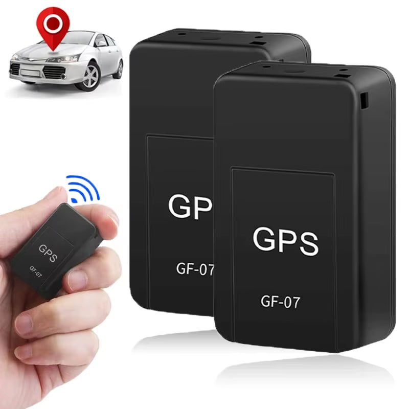Magnetic GPS tracker being attached under a car for security.