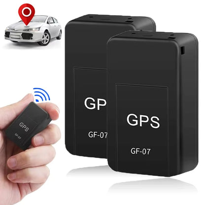 Magnetic GPS tracker being attached under a car for security.